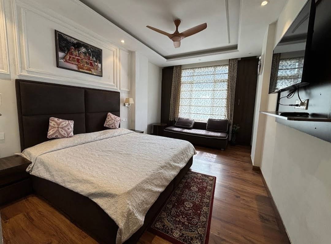 Comfortable hotel bedroom with warm lighting